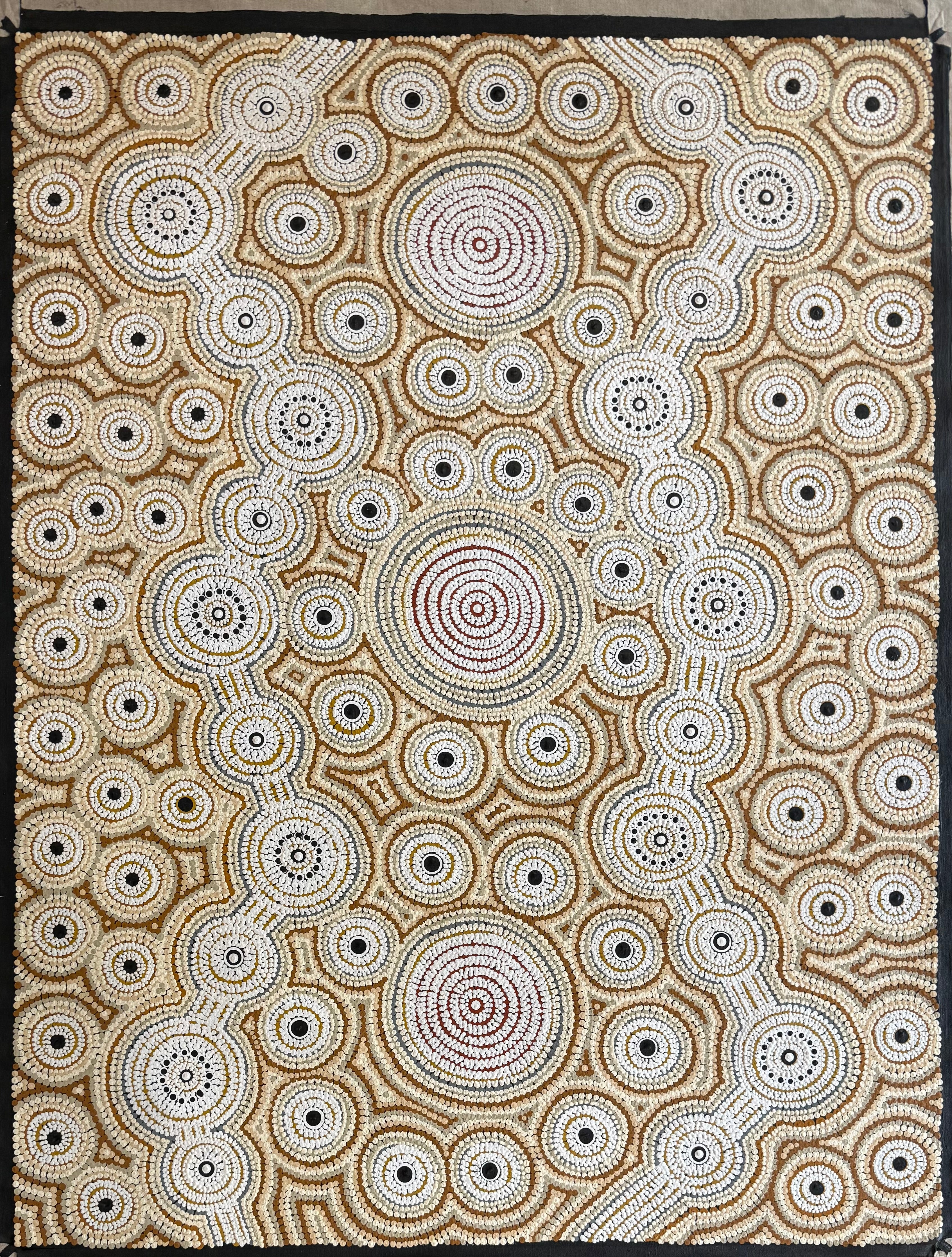 A large, highly intricate dot painting depicting Honey-Suckle Flower Dreaming by Peter Mbitjana Palmer in shades of white and brown | Raintree Art Aboriginal Art Ballarat