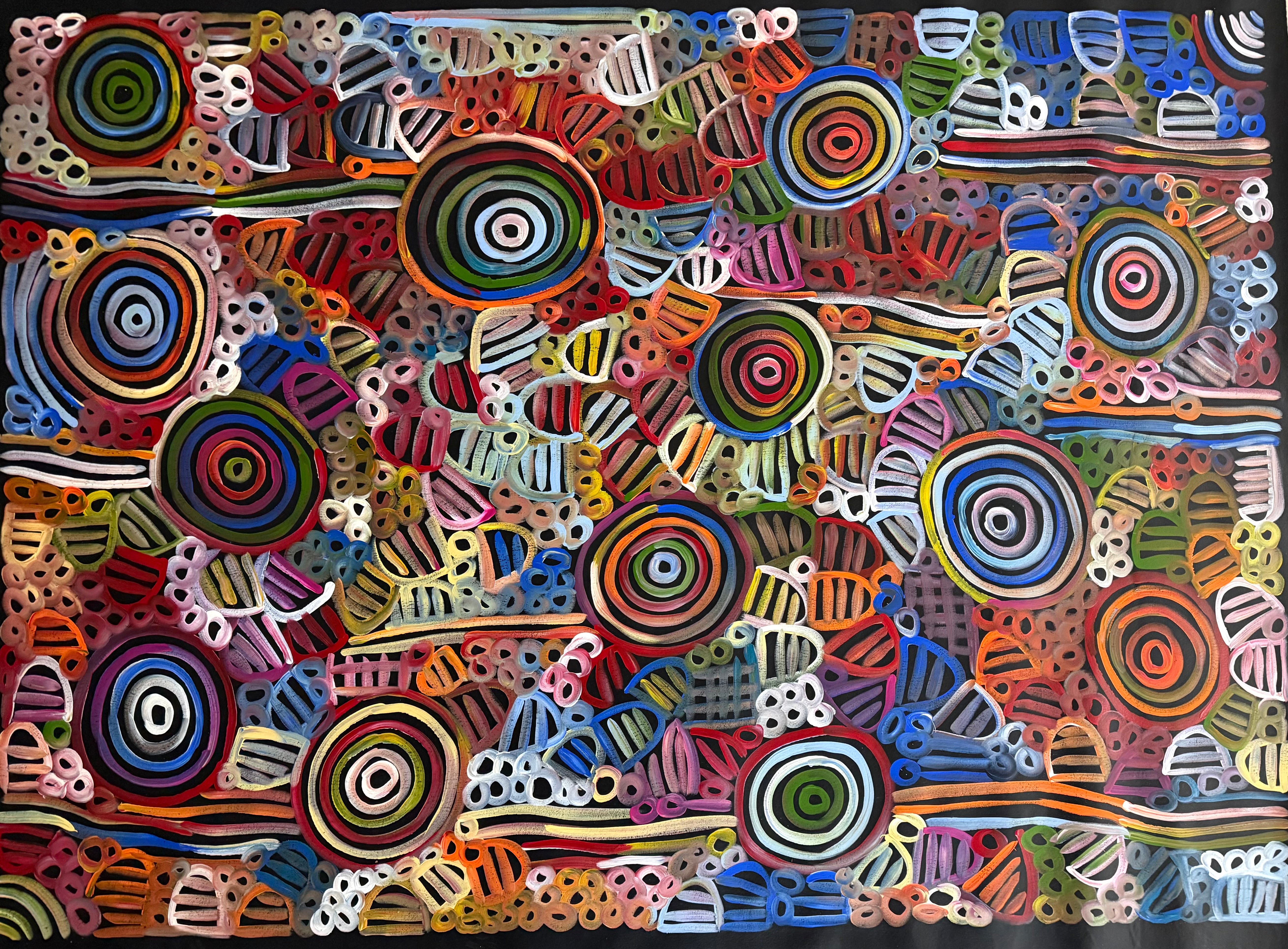 Aboriginal paintings in many sizes featuring women's ceremony