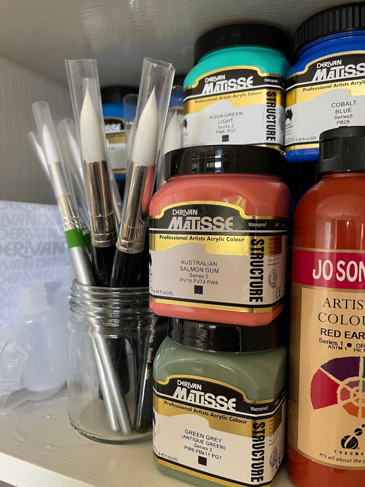 Art Supplies on a shelf at Raintree Art, Aboriginal Art Ballarat